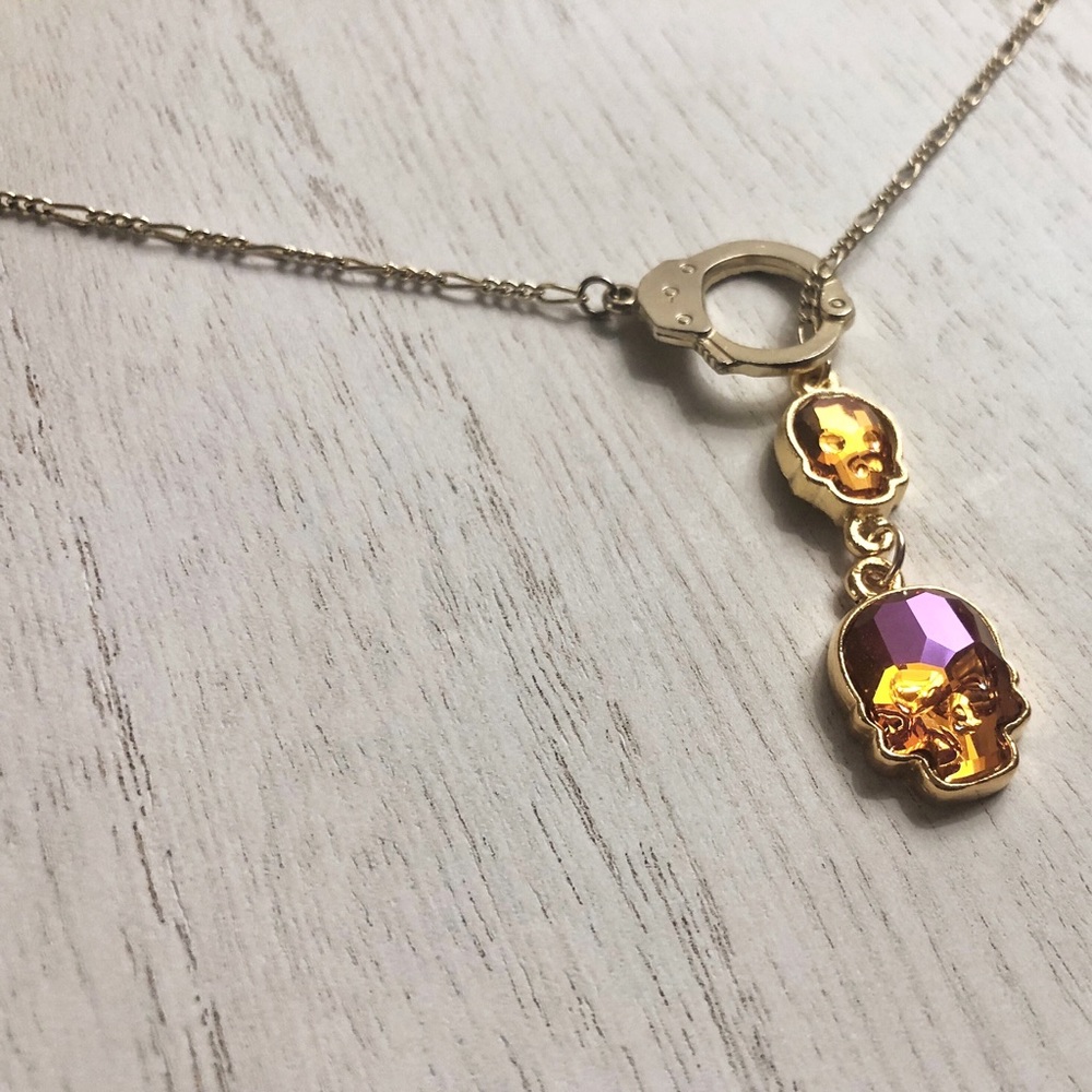 Swarovski skulls and handcuff clasp necklace
